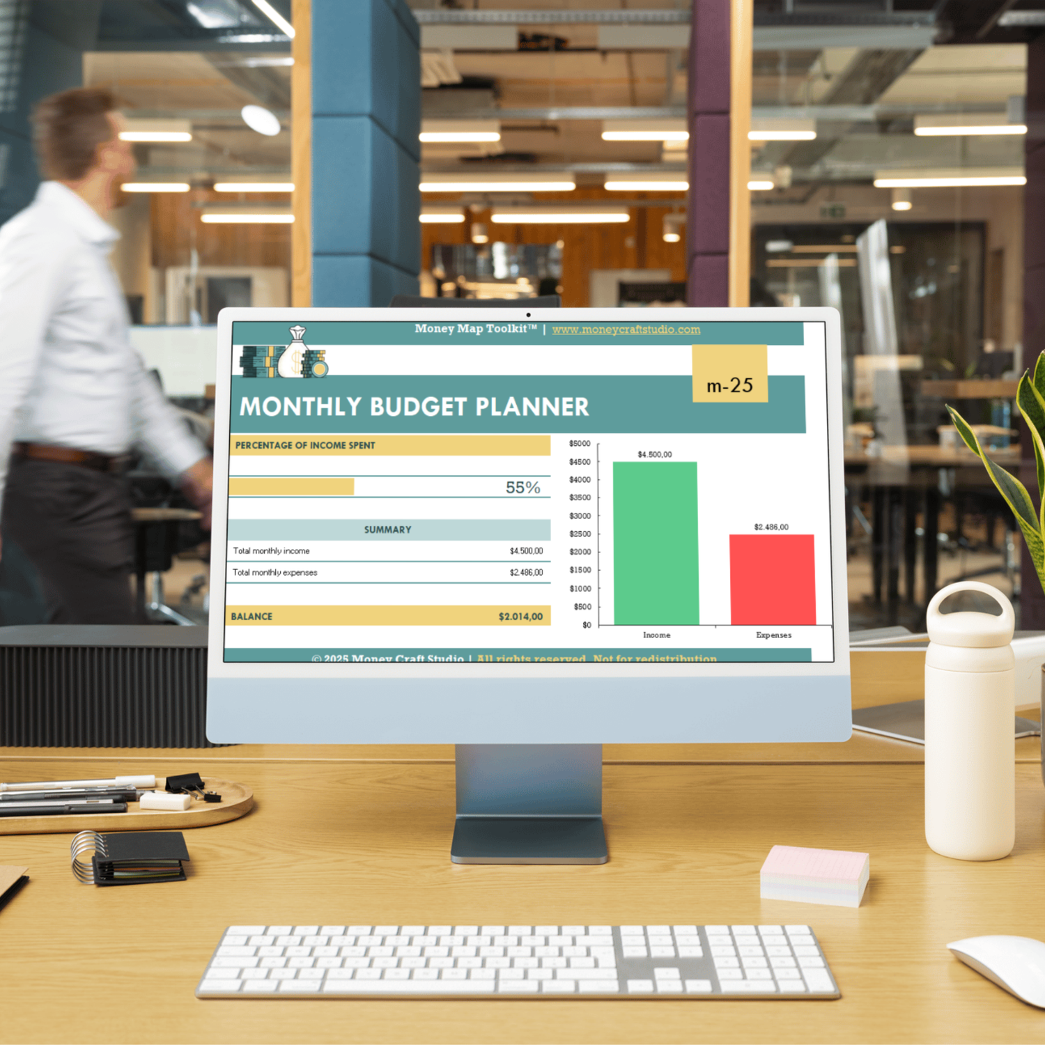 Mockup Image Monthly Budget Planner in PC on Office Desk
